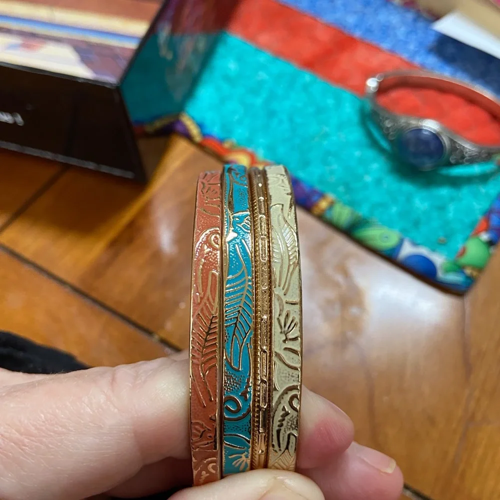 Avon set of 4 Bangle Bracelets